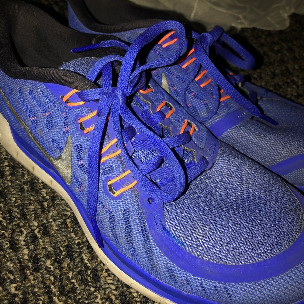 Blue women’s Nike running shoe